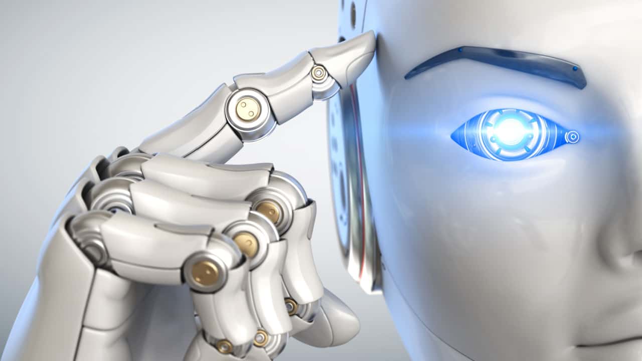 Artificial Intelligence steeds meer in opkomst. Een robot wijst naar zijn hoofd.